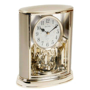 Rhythm Two Tone Oval Rotating Pendulum Mantel Clock - Gold