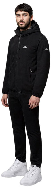 Helvetica Mountain Pioneers Eyeblock-Windjacke mit Kapuze – Schwarz