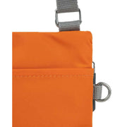 Roka Chelsea Sustainable Nylon Pocket Sling Bag - Burnt Orange